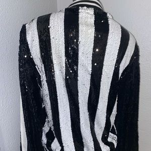 Black and white zip up jacket with sequin